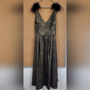 Midi black and gold dress with feather pom sleeves